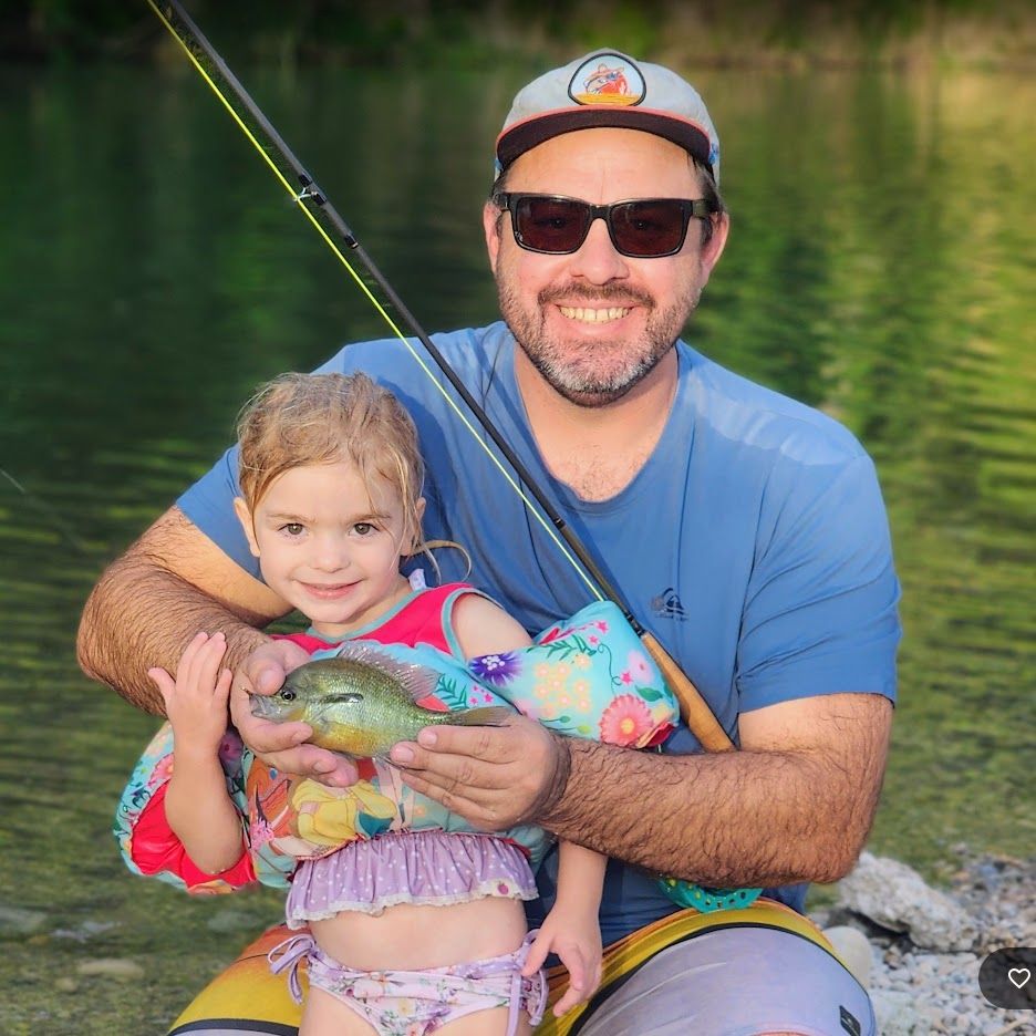 Jack Lienhard fishing with his daughter in New Braunfels, Texas